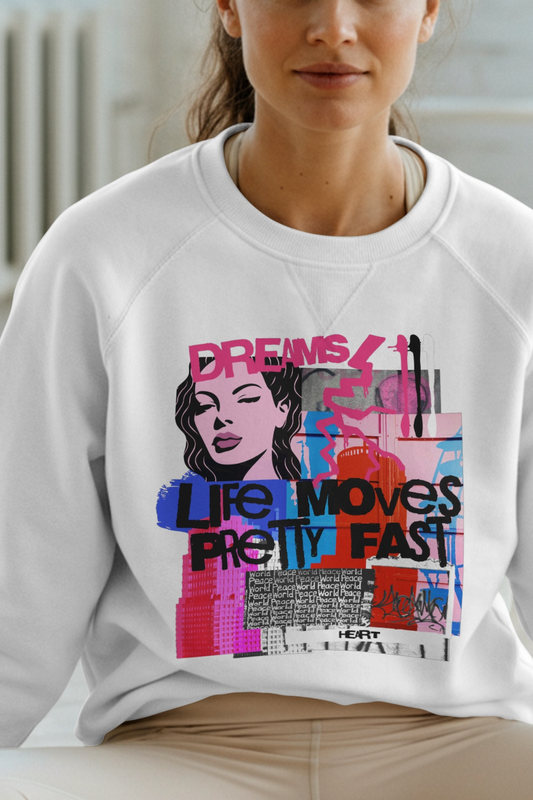 Person wearing a white sweatshirt with colorful graphic design and text.