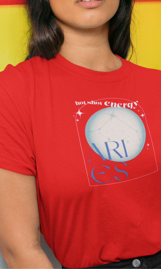 Person wearing a red t-shirt with a graphic design on a yellow background