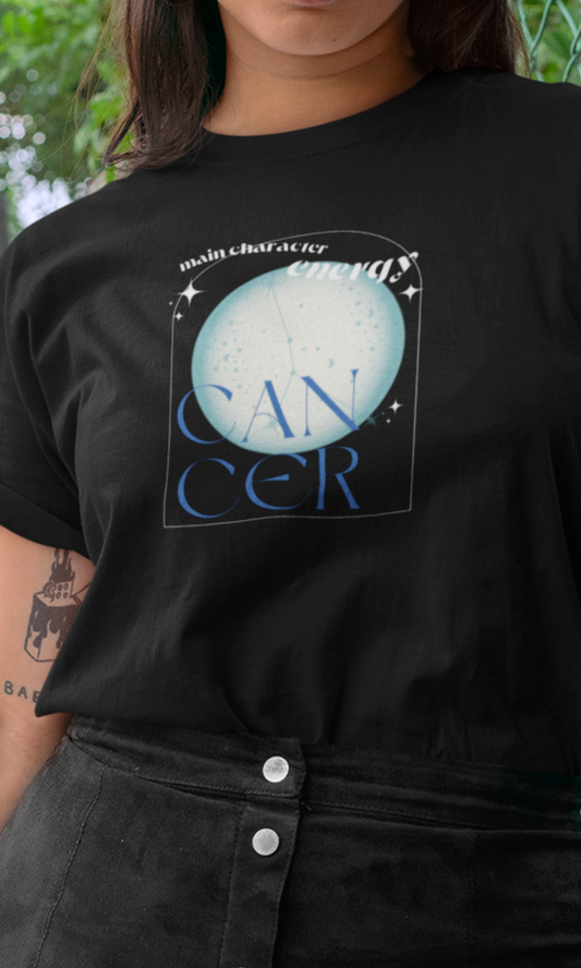 Person wearing a black t-shirt with 'Cancer' zodiac design