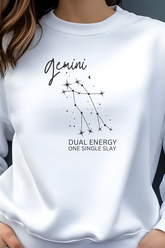 White sweatshirt with Gemini constellation design and text on a plain background