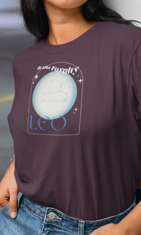 Person wearing a purple t-shirt with a Leo zodiac design.