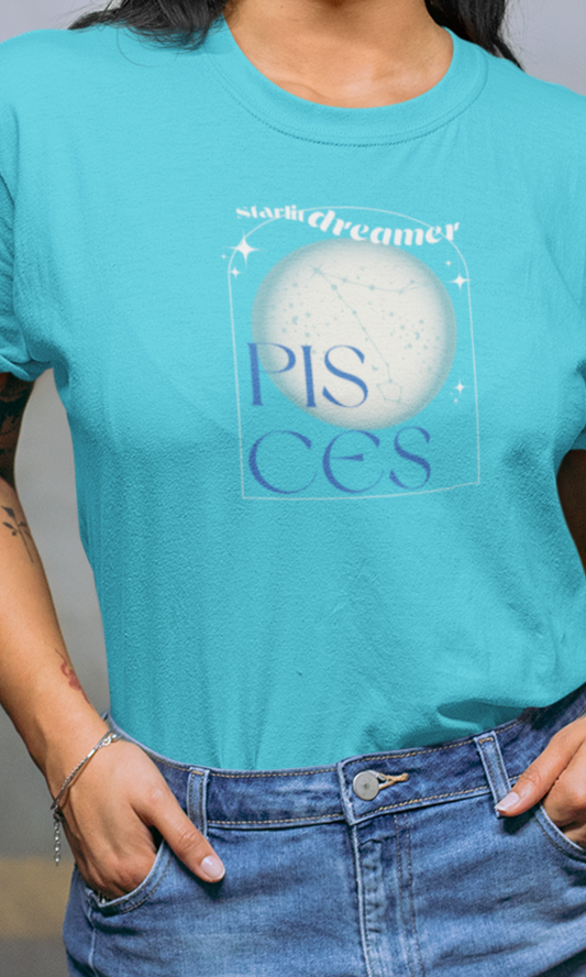 Person wearing a turquoise t-shirt with 'Pisces' design