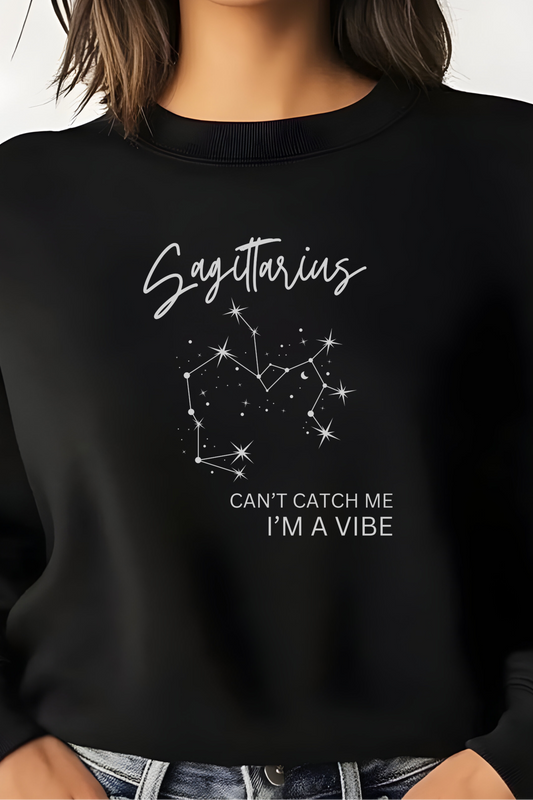 Black sweatshirt with Sagittarius constellation design and text on a plain background