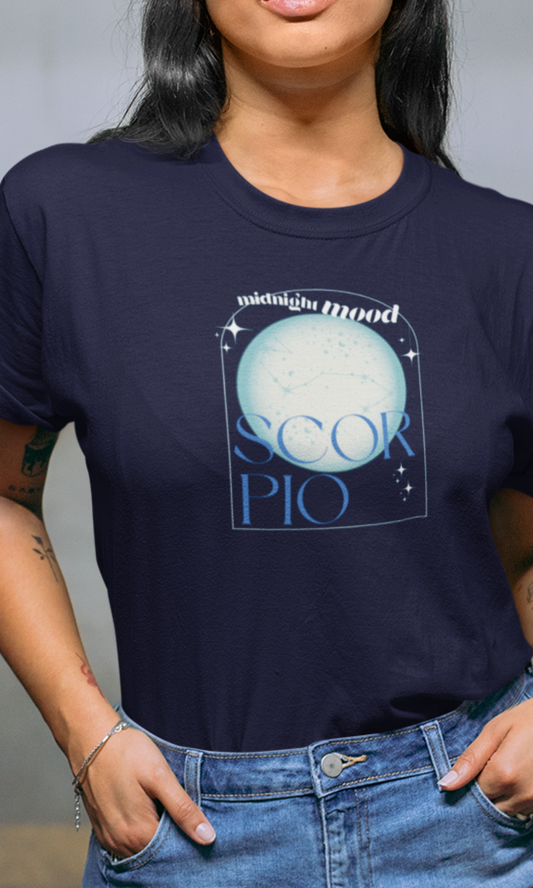 Person wearing a navy blue t-shirt with 'Scorpio' graphic design.
